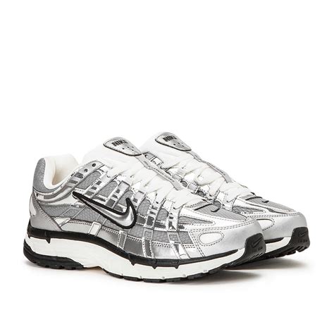 silver Nike shoes